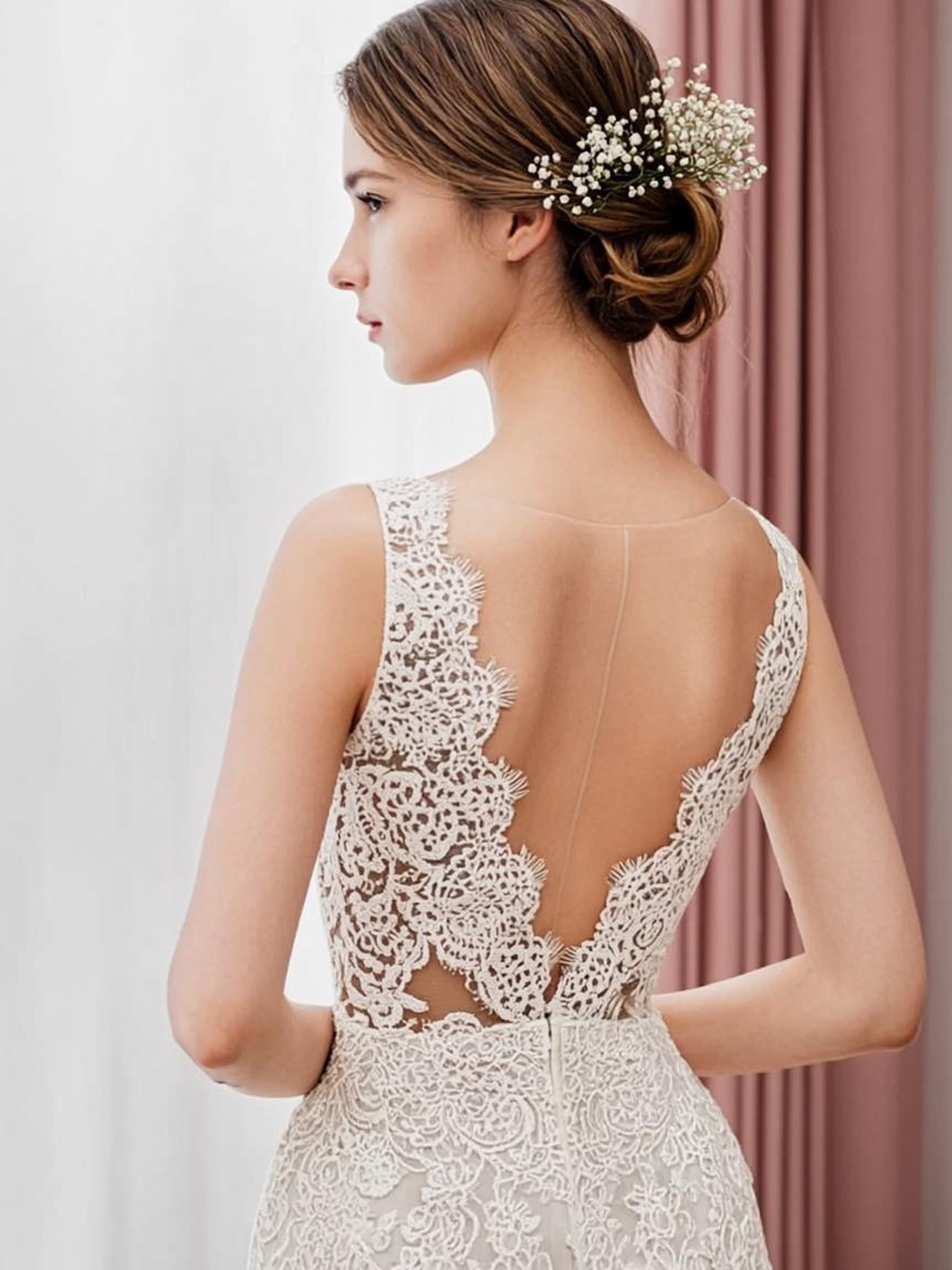 Bridal updo with delicate detailing